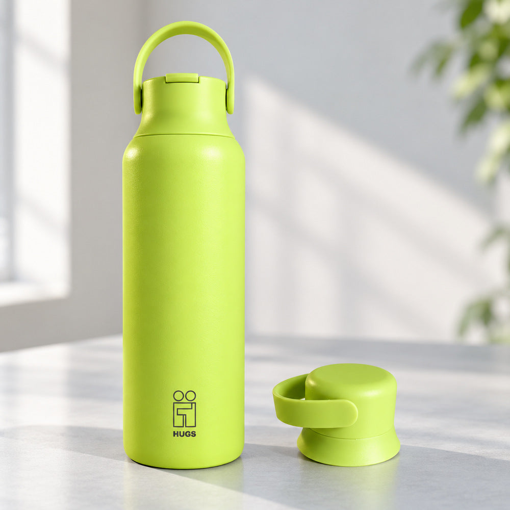 Hugs Zero 600ml Lime Energy, με το καπάκι με καλαμάκι και το δεύτερο καπάκι δίπλα