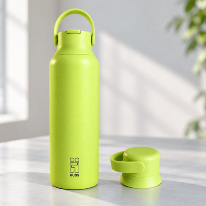 Hugs Zero 600ml Lime Energy, με το καπάκι με καλαμάκι και το δεύτερο καπάκι δίπλα