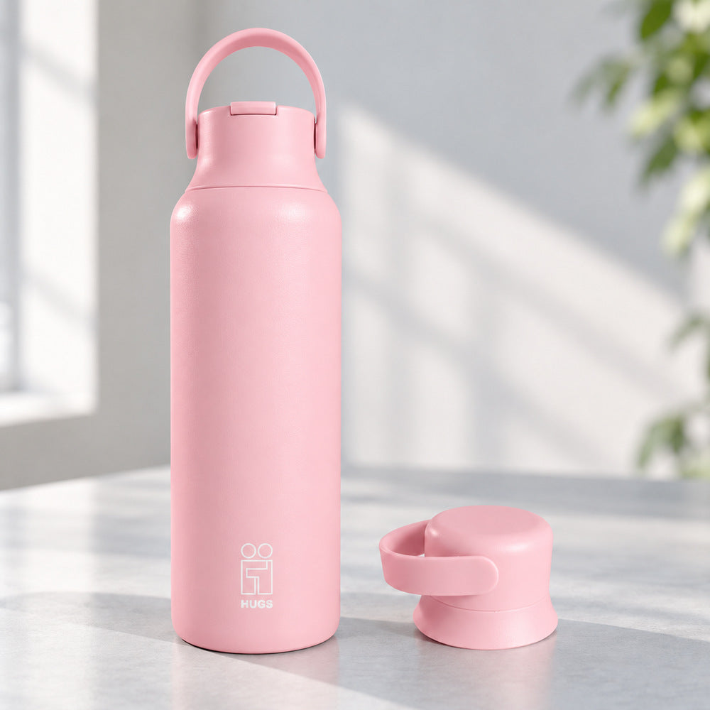 Hugs Zero 600ml Pink Whisper, με το καπάκι με καλαμάκι και το δεύτερο καπάκι δίπλα