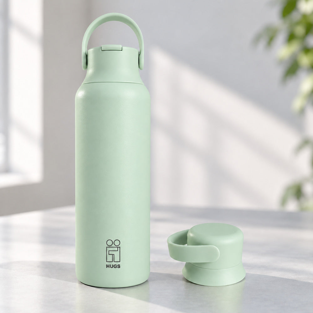 Hugs Zero 600ml Teal Touch, με το καπάκι με καλαμάκι και το δεύτερο καπάκι δίπλα